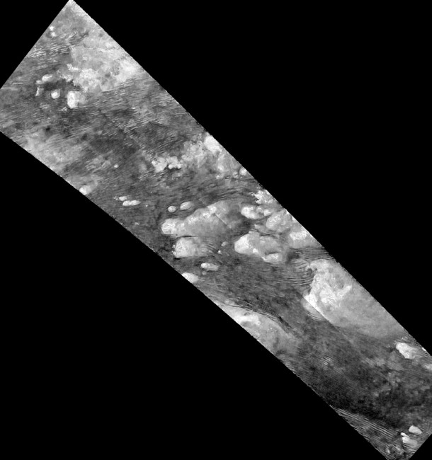 Hundreds of sand dunes are visible as dark lines snaking across the surface. Image Credit: NASA/JPL-Caltech/ASI/Université Paris-Diderot Hundreds of sand dunes are visible as dark lines snaking across the surface. Image Credit: NASA/JPL-Caltech/ASI/Université Paris-Diderot