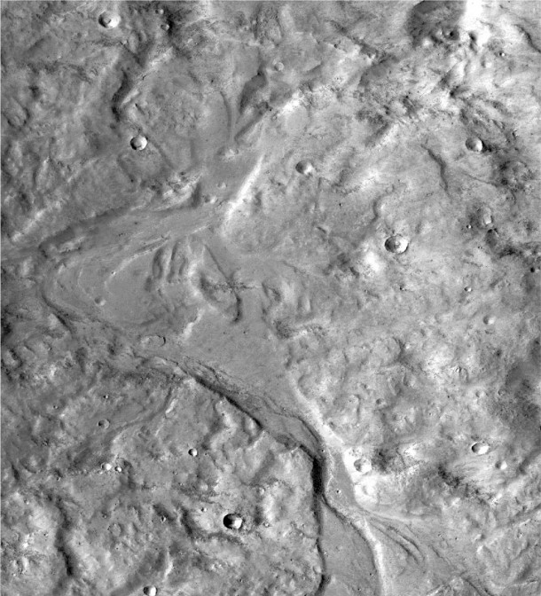 Streamlined forms in this Martian valley resulted from the outflow of a lake hundreds of millions years more recently than an era of Martian lakes previously confirmed. Image credit: NASA/JPL-Caltech/MSSS Streamlined forms in this Martian valley resulted from the outflow of a lake hundreds of millions years more recently than an era of Martian lakes previously confirmed. Image credit: NASA/JPL-Caltech/MSSS