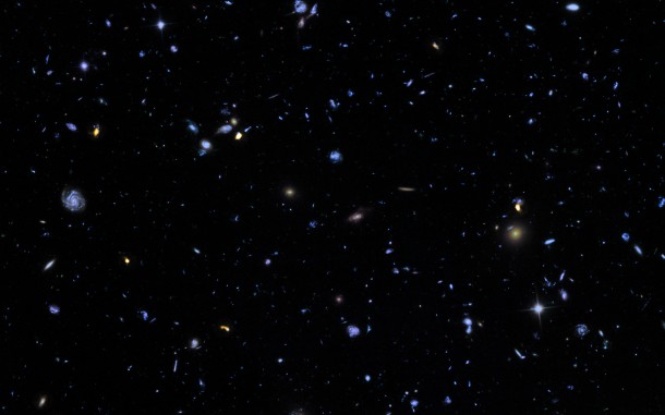 The image covers a region less than a tenth of the width of the full Moon across, making it just a 30 millionth of the whole sky. Yet even in this tiny fraction of the sky, the long exposure reveals about 5500 galaxies, some of them so distant that we see them when the Universe was less than 5% of its current age. The Hubble eXtreme Deep Field image contains several of the most distant objects ever identified. Credit: NASA, ESA, G. Illingworth, D. Magee, and P. Oesch (University of California, Santa Cruz), R. Bouwens (Leiden University), and the HUDF09 Team The image covers a region less than a tenth of the width of the full Moon across, making it just a 30 millionth of the whole sky. Yet even in this tiny fraction of the sky, the long exposure reveals about 5500 galaxies, some of them so distant that we see them when the Universe was less than 5% of its current age. The Hubble eXtreme Deep Field image contains several of the most distant objects ever identified. Credit: NASA, ESA, G. Illingworth, D. Magee, and P. Oesch (University of California, Santa Cruz), R. Bouwens (Leiden University), and the HUDF09 Team