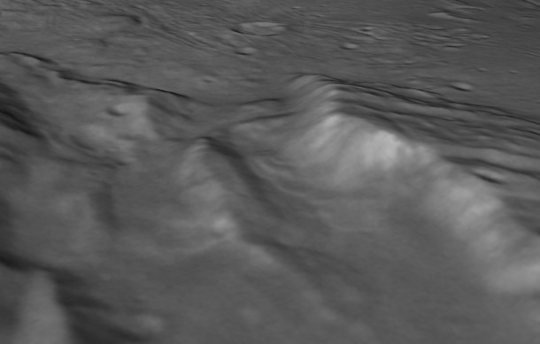 Scientists from NASA's New Horizons mission have spotted signs of long run-out landslides on Pluto's largest moon, Charon. This perspective view of a chasm on Charon uses stereo reconstruction of images taken by two cameras on New Horizons, supplemented by a "shape-from-shading" algorithm. Image Credit: NASA/Johns Hopkins University Applied Physics Laboratory/Southwest Research Center Scientists from NASA's New Horizons mission have spotted signs of long run-out landslides on Pluto's largest moon, Charon. This perspective view of a chasm on Charon uses stereo reconstruction of images taken by two cameras on New Horizons, supplemented by a "shape-from-shading" algorithm. Image Credit: NASA/Johns Hopkins University Applied Physics Laboratory/Southwest Research Center