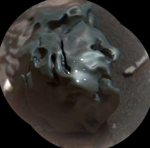 The dark, golf-ball-size object in this composite, colorized view from the ChemCam instrument on NASA's Curiosity Mars rover is a nickel-iron meteorite, as confirmed by analysis using laser pulses from ChemCam on Oct. 30, 2016. The grid of bright spots on the rock resulted from the laser pulses. Credit: NASA/JPL-Caltech/LANL/CNES/IRAP/LPGNantes/CNRS/IAS/MSSS The dark, golf-ball-size object in this composite, colorized view from the ChemCam instrument on NASA's Curiosity Mars rover is a nickel-iron meteorite, as confirmed by analysis using laser pulses from ChemCam on Oct. 30, 2016. The grid of bright spots on the rock resulted from the laser pulses. Credit: NASA/JPL-Caltech/LANL/CNES/IRAP/LPGNantes/CNRS/IAS/MSSS