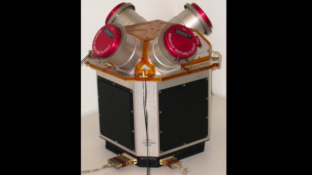 This cluster of four colloid thrusters, part of the Disturbance Reduction System developed by NASA/JPL, helps keep the LISA Pathfinder spacecraft extremely stable. This cluster of four colloid thrusters, part of the Disturbance Reduction System developed by NASA/JPL, helps keep the LISA Pathfinder spacecraft extremely stable.
