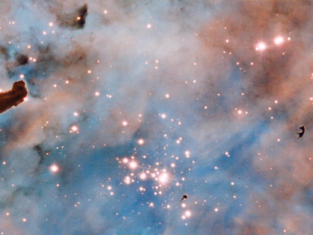 The prominent dark patches, in the central region and to the right of the image are a so called Bok globule: these are isolated and relatively small dark nebulae, containing dense dust and gas. These objects are still subjects of intense research as their structure and density remains somewhat a mystery. Credit: ESO/A. McLeod The prominent dark patches, in the central region and to the right of the image are a so called Bok globule: these are isolated and relatively small dark nebulae, containing dense dust and gas. These objects are still subjects of intense research as their structure and density remains somewhat a mystery. Credit: ESO/A. McLeod