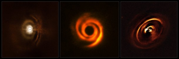 These three planetary discs have been observed with the SPHERE instrument, mounted on ESO’s Very Large Telescope. The observations were made in order to shed light on the enigmatic evolution of fledgling planetary systems. The central parts of the images appear dark because SPHERE blocks out the light from the brilliant central stars to reveal the much fainter structures surrounding them. Credit: ESO These three planetary discs have been observed with the SPHERE instrument, mounted on ESO’s Very Large Telescope. The observations were made in order to shed light on the enigmatic evolution of fledgling planetary systems. The central parts of the images appear dark because SPHERE blocks out the light from the brilliant central stars to reveal the much fainter structures surrounding them. Credit: ESO