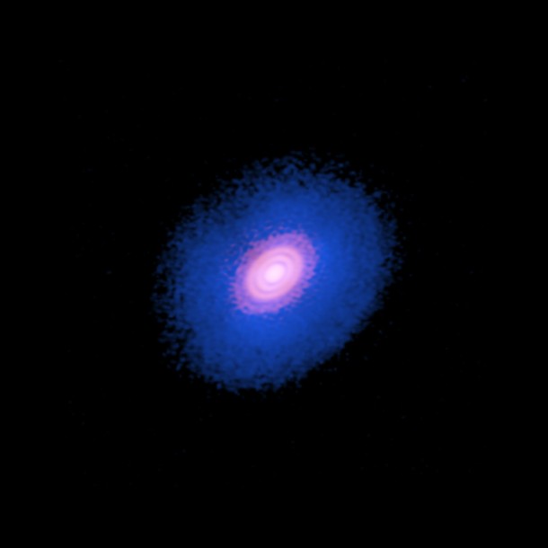 Composite image of the protoplanetary disk surrounding the young star HD 163296. The inner red area shows the dust of the protoplanetary disk. The broader blue disk is the carbon monoxide gas in the system. ALMA observed that in the outer two gaps in the dust, there was a significant dip in the concentration of carbon monoxide, suggesting two planets are forming there. Credit: ALMA (ESO/NAOJ/NRAO); A. Isella; B. Saxton (NRAO/AUI/NSF) Composite image of the protoplanetary disk surrounding the young star HD 163296. The inner red area shows the dust of the protoplanetary disk. The broader blue disk is the carbon monoxide gas in the system. ALMA observed that in the outer two gaps in the dust, there was a significant dip in the concentration of carbon monoxide, suggesting two planets are forming there. Credit: ALMA (ESO/NAOJ/NRAO); A. Isella; B. Saxton (NRAO/AUI/NSF)