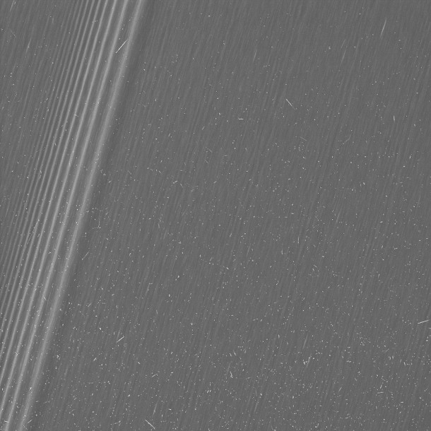 This image from NASA's Cassini mission shows a region in Saturn's A ring. The level of detail is twice as high as this part of the rings has ever been seen before. The view contains many small, bright blemishes due to cosmic rays and charged particle radiation near the planet. Image Credit: NASA/JPL-Caltech/Space Science Institute This image from NASA's Cassini mission shows a region in Saturn's A ring. The level of detail is twice as high as this part of the rings has ever been seen before. The view contains many small, bright blemishes due to cosmic rays and charged particle radiation near the planet. Image Credit: NASA/JPL-Caltech/Space Science Institute