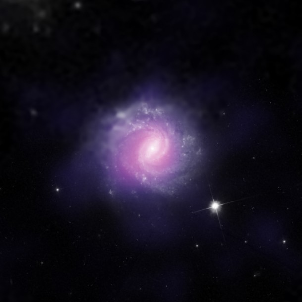 This galaxy, called IC 3639, also contains an example of an obscured supermassive black hole. Image credit: ESO/NASA/JPL-Caltech/STScI This galaxy, called IC 3639, also contains an example of an obscured supermassive black hole. Image credit: ESO/NASA/JPL-Caltech/STScI