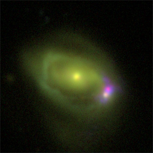This optical image shows the Was 49 system, which consists of a large disk galaxy, Was 49a, merging with a much smaller "dwarf" galaxy Was 49b. Credits: DCT/NRL This optical image shows the Was 49 system, which consists of a large disk galaxy, Was 49a, merging with a much smaller "dwarf" galaxy Was 49b. Credits: DCT/NRL