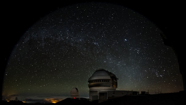 The Gemini North telescope (foreground, right) with the Canada-France-Hawaii Telescope in background (left). Image obtained during observations for Col-OSSOS and both telescopes are pointing at the same target.Credit: Gemini Observatory/AURA, photo by Joy Pollard. The Gemini North telescope (foreground, right) with the Canada-France-Hawaii Telescope in background (left). Image obtained during observations for Col-OSSOS and both telescopes are pointing at the same target.Credit: Gemini Observatory/AURA, photo by Joy Pollard.