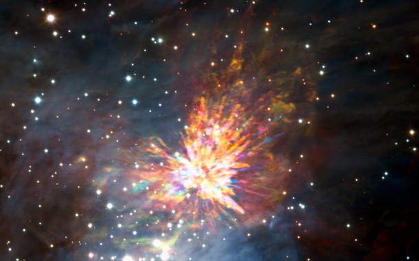 The colours in the ALMA data represent the relative Doppler shifting of the millimetre-wavelength light emitted by carbon monoxide gas. The blue colour in the ALMA data represents gas approaching at the highest speeds; the red colour is from gas moving toward us more slowly. Credit: ALMA (ESO/NAOJ/NRAO), J. Bally/H. Drass et al. The colours in the ALMA data represent the relative Doppler shifting of the millimetre-wavelength light emitted by carbon monoxide gas. The blue colour in the ALMA data represents gas approaching at the highest speeds; the red colour is from gas moving toward us more slowly. Credit: ALMA (ESO/NAOJ/NRAO), J. Bally/H. Drass et al.