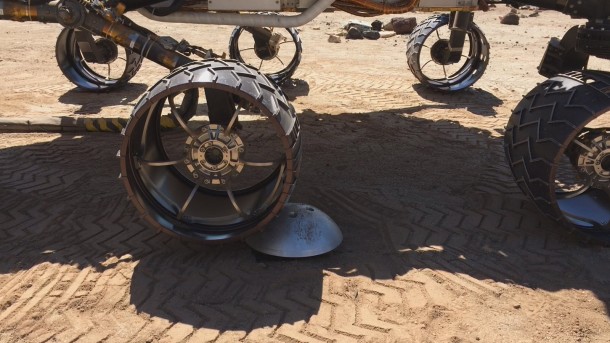 A "scarecrow" rover at NASA's JPL drives over a sensor while testing a new driving algorithm. Engineers created the algorithm to reduce wheel wear on the Mars Curiosity rover. Image Credit: NASA/JPL-Caltech A "scarecrow" rover at NASA's JPL drives over a sensor while testing a new driving algorithm. Engineers created the algorithm to reduce wheel wear on the Mars Curiosity rover. Image Credit: NASA/JPL-Caltech