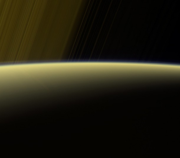 This false-color view from NASA's Cassini spacecraft gazes toward the rings beyond Saturn's sunlit horizon, where a thin haze can be seen along the limb. Image credit: NASA/JPL-Caltech/Space Science Institute This false-color view from NASA's Cassini spacecraft gazes toward the rings beyond Saturn's sunlit horizon, where a thin haze can be seen along the limb. Image credit: NASA/JPL-Caltech/Space Science Institute