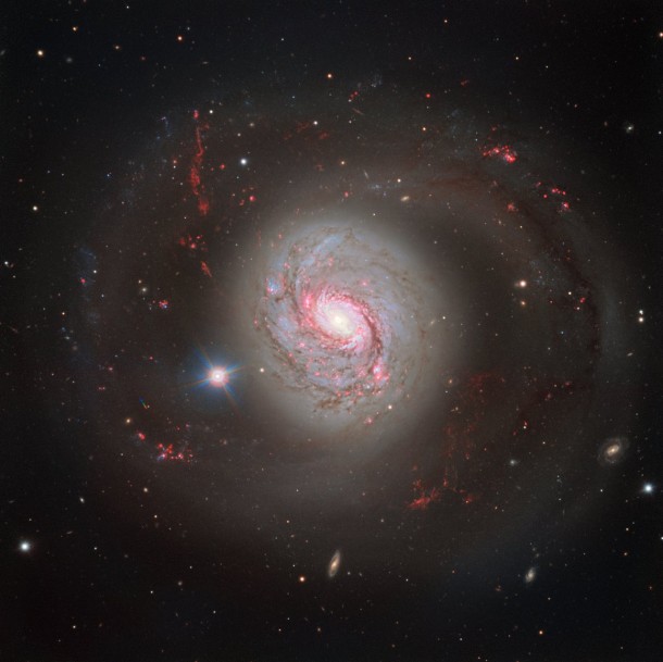 ESO’s Very Large Telescope (VLT) has captured a magnificent face-on view of the barred spiral galaxy Messier 77. The image does justice to the galaxy’s beauty, showcasing its glittering arms criss-crossed with dust lanes — but it fails to betray Messier 77’s turbulent nature. Credit: ESO ESO’s Very Large Telescope (VLT) has captured a magnificent face-on view of the barred spiral galaxy Messier 77. The image does justice to the galaxy’s beauty, showcasing its glittering arms criss-crossed with dust lanes — but it fails to betray Messier 77’s turbulent nature. Credit: ESO