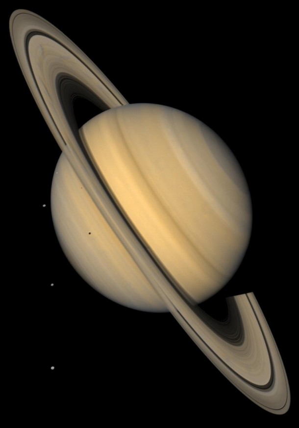 This approximate natural-color image shows Saturn, its rings, and four of its icy satellites. Image credit: NASA/JPL/USGS This approximate natural-color image shows Saturn, its rings, and four of its icy satellites. Image credit: NASA/JPL/USGS