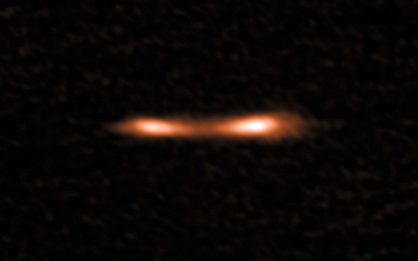 This ALMA image shows the Cosmic Eyelash, a remote starburst galaxy that appears double and brightened by gravitational lensing. ALMA has been used to detect turbulent reservoirs of cold gas surrounding this and other distant starburst galaxies. By detecting CH+ for the first time in the distant Universe, this research opens up a new window of exploration into a critical epoch of star formation. Credit: ALMA (ESO/NAOJ/NRAO)/E. Falgarone et al. This ALMA image shows the Cosmic Eyelash, a remote starburst galaxy that appears double and brightened by gravitational lensing. ALMA has been used to detect turbulent reservoirs of cold gas surrounding this and other distant starburst galaxies. By detecting CH+ for the first time in the distant Universe, this research opens up a new window of exploration into a critical epoch of star formation. Credit: ALMA (ESO/NAOJ/NRAO)/E. Falgarone et al.