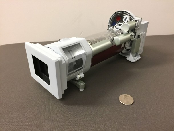 A 3-D printed model of Mastcam-Z, one of the science cameras on the Mars 2020 rover. Mastcam-Z will include a 3:1 zoom lens. A quarter is provided for scale. Image Credit: NASA/JPL-Caltech A 3-D printed model of Mastcam-Z, one of the science cameras on the Mars 2020 rover. Mastcam-Z will include a 3:1 zoom lens. A quarter is provided for scale. Image Credit: NASA/JPL-Caltech