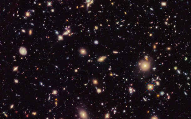 This image shows the Hubble Ultra Deep Field 2012, an improved version of the Hubble Ultra Deep Field image featuring additional observation time. The new data have revealed for the first time a population of distant galaxies at redshifts between 9 and 12, including the most distant object observed to date. These galaxies will require confirmation using spectroscopy by the forthcoming NASA/ESA/CSA James Webb Space Telescope before they are considered to be fully confirmed. Credit: NASA, ESA, R. Ellis (Caltech), and the HUDF 2012 Team This image shows the Hubble Ultra Deep Field 2012, an improved version of the Hubble Ultra Deep Field image featuring additional observation time. The new data have revealed for the first time a population of distant galaxies at redshifts between 9 and 12, including the most distant object observed to date. These galaxies will require confirmation using spectroscopy by the forthcoming NASA/ESA/CSA James Webb Space Telescope before they are considered to be fully confirmed. Credit: NASA, ESA, R. Ellis (Caltech), and the HUDF 2012 Team