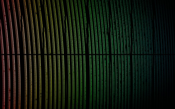 This colourful image shows spectral data from the First Light of the ESPRESSO instrument on ESO's Very Large Telescope in Chile. The light from a star has been dispersed into its component colours. This view has been colourised to indicate how the wavelengths change across the image, but these are not exactly the colours that would be seen visually. Close inspection shows many dark spectral lines in the stellar spectra and also the regular double spots from a calibration light source. The dark gaps are features of how the data is taken, and are not real. Credit: ESO/ESPRESSO team This colourful image shows spectral data from the First Light of the ESPRESSO instrument on ESO's Very Large Telescope in Chile. The light from a star has been dispersed into its component colours. This view has been colourised to indicate how the wavelengths change across the image, but these are not exactly the colours that would be seen visually. Close inspection shows many dark spectral lines in the stellar spectra and also the regular double spots from a calibration light source. The dark gaps are features of how the data is taken, and are not real. Credit: ESO/ESPRESSO team