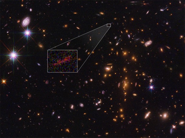 This Hubble Space Telescope image shows the farthest galaxy yet seen in an image that has been stretched and amplified by a phenomenon called gravitational lensing. Credits: NASA , ESA, and B. Salmon (STScI) This Hubble Space Telescope image shows the farthest galaxy yet seen in an image that has been stretched and amplified by a phenomenon called gravitational lensing. Credits: NASA , ESA, and B. Salmon (STScI)