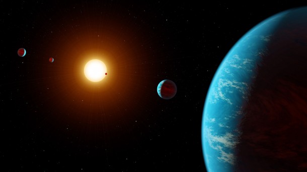 This artist concept shows K2-138, the first multi-planet system discovered by citizen scientists. The central star is slightly smaller and cooler than our Sun. The five known planets are all between the size of Earth and Neptune. Planet b may potentially be rocky, but planets c, d, e, and f likely contain large amounts of ice and gas. All five planets have orbital periods shorter than 13 days and are all incredibly hot, ranging from 800 to 1,800 degrees Fahrenheit. Image credit: NASA/JPL-Caltech This artist concept shows K2-138, the first multi-planet system discovered by citizen scientists. The central star is slightly smaller and cooler than our Sun. The five known planets are all between the size of Earth and Neptune. Planet b may potentially be rocky, but planets c, d, e, and f likely contain large amounts of ice and gas. All five planets have orbital periods shorter than 13 days and are all incredibly hot, ranging from 800 to 1,800 degrees Fahrenheit. Image credit: NASA/JPL-Caltech