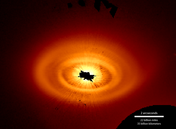 Arcs, rings and spirals appear in the debris disk around the star HD 141569A. The black region in the center is caused by a mask that blocks direct light from the star. This image incorporates observations made in June and August 2015 using the Hubble Space Telescope's STIS instrument. Credits: NASA/Hubble/Konishi et al. 2016 Arcs, rings and spirals appear in the debris disk around the star HD 141569A. The black region in the center is caused by a mask that blocks direct light from the star. This image incorporates observations made in June and August 2015 using the Hubble Space Telescope's STIS instrument. Credits: NASA/Hubble/Konishi et al. 2016