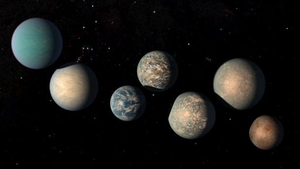 This illustration shows the seven Earth-size planets of TRAPPIST-1. The image does not show the planets' orbits to scale, but highlights possibilities for how the surfaces of these intriguing worlds might look. Image Credit: NASA/JPL-Caltech This illustration shows the seven Earth-size planets of TRAPPIST-1. The image does not show the planets' orbits to scale, but highlights possibilities for how the surfaces of these intriguing worlds might look. Image Credit: NASA/JPL-Caltech