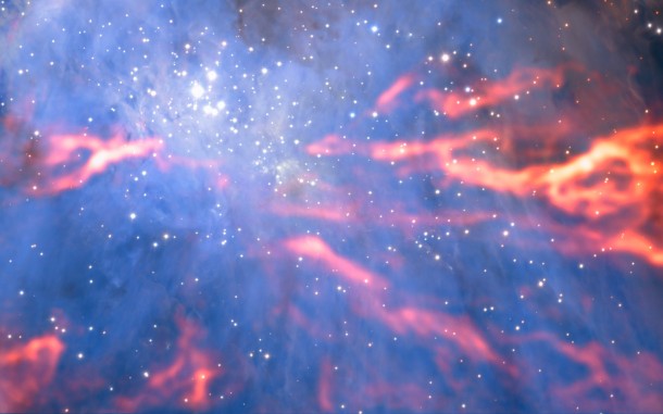 This spectacular and unusual image shows part of the famous Orion Nebula, a star formation region lying about 1350 light-years from Earth. It combines a mosaic of millimetre wavelength images from the Atacama Large Millimeter/submillimeter Array (ALMA) and the IRAM 30-metre telescope, shown in red, with a more familiar infrared view from the HAWK-I instrument on ESO’s Very Large Telescope, shown in blue. The group of bright blue-white stars at the left is the Trapezium Cluster — made up of hot young stars that are only a few million years old. Credit: ESO/H. Drass/ALMA (ESO/NAOJ/NRAO)/A. Hacar This spectacular and unusual image shows part of the famous Orion Nebula, a star formation region lying about 1350 light-years from Earth. It combines a mosaic of millimetre wavelength images from the Atacama Large Millimeter/submillimeter Array (ALMA) and the IRAM 30-metre telescope, shown in red, with a more familiar infrared view from the HAWK-I instrument on ESO’s Very Large Telescope, shown in blue. The group of bright blue-white stars at the left is the Trapezium Cluster — made up of hot young stars that are only a few million years old. Credit: ESO/H. Drass/ALMA (ESO/NAOJ/NRAO)/A. Hacar