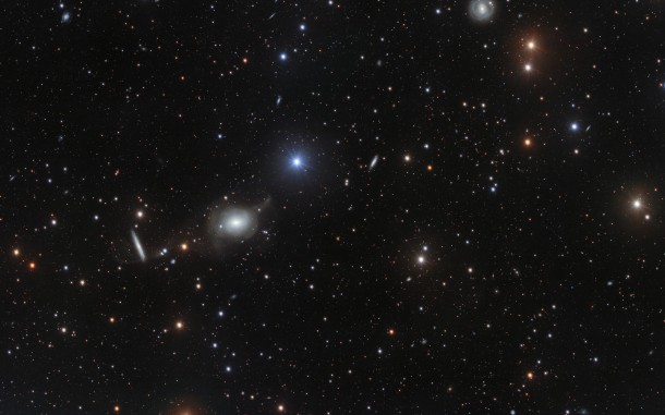 This deep image of the area of sky around the elliptical galaxy NGC 5018 offers a spectacular view of its tenuous streams of stars and gas. These delicate features are hallmarks of galactic interactions, and provide vital clues to the structure and dynamics of early-type galaxies. Credit: ESO/Spavone et al. This deep image of the area of sky around the elliptical galaxy NGC 5018 offers a spectacular view of its tenuous streams of stars and gas. These delicate features are hallmarks of galactic interactions, and provide vital clues to the structure and dynamics of early-type galaxies. Credit: ESO/Spavone et al.