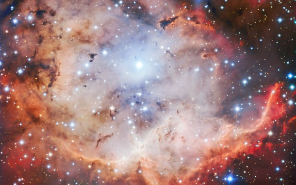 This vivid picture of an active star forming region — NGC 2467, otherwise known as the Skull and Crossbones nebula — is as sinister as it is beautiful. This image of dust, gas and bright young stars, gravitationally bound into the form of a grinning skull, was captured with the FORS instrument on ESO’s Very Large Telescope (VLT). Whilst ESO’s telescopes are usually used for the collection of science data, their immense resolving power makes them ideal for capturing images such as this — which are beautiful for their own sake. Credit: ESO This vivid picture of an active star forming region — NGC 2467, otherwise known as the Skull and Crossbones nebula — is as sinister as it is beautiful. This image of dust, gas and bright young stars, gravitationally bound into the form of a grinning skull, was captured with the FORS instrument on ESO’s Very Large Telescope (VLT). Whilst ESO’s telescopes are usually used for the collection of science data, their immense resolving power makes them ideal for capturing images such as this — which are beautiful for their own sake. Credit: ESO