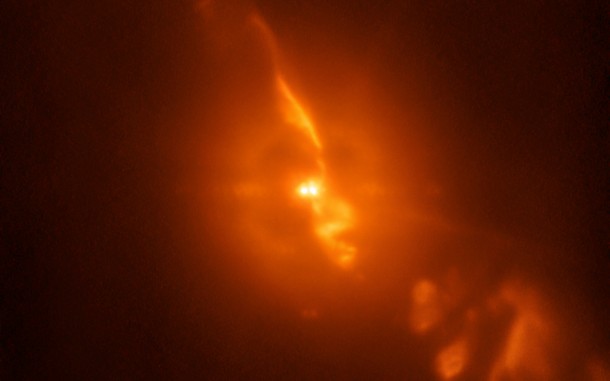 This image is from the SPHERE/ZIMPOL observations of R Aquarii, and shows the binary star itself, as well as the jets of material spewing from the stellar couple. Credit: ESO/Schmid et al. This image is from the SPHERE/ZIMPOL observations of R Aquarii, and shows the binary star itself, as well as the jets of material spewing from the stellar couple. Credit: ESO/Schmid et al.